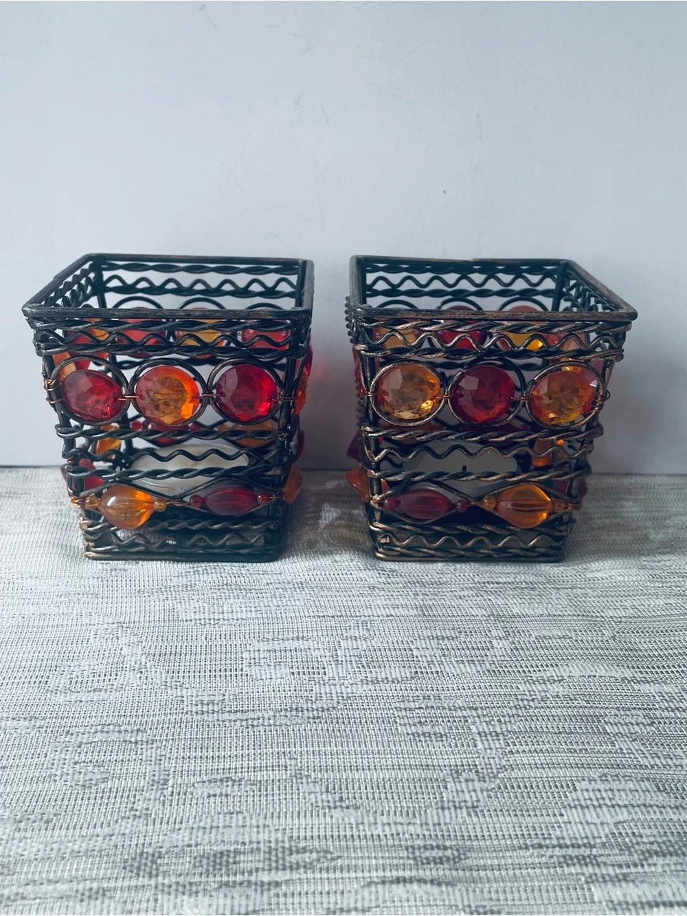 Pair of Home Accents Amber and Red Beaded Metal Votive Holders